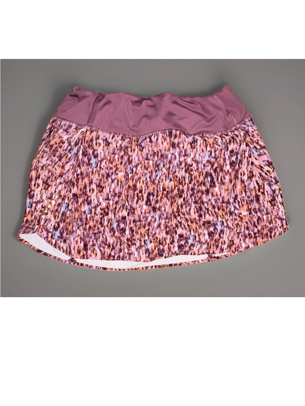 Athleta Run With It Women’s Tennis Skort L Purple Abstract Stretch Zip Pocket